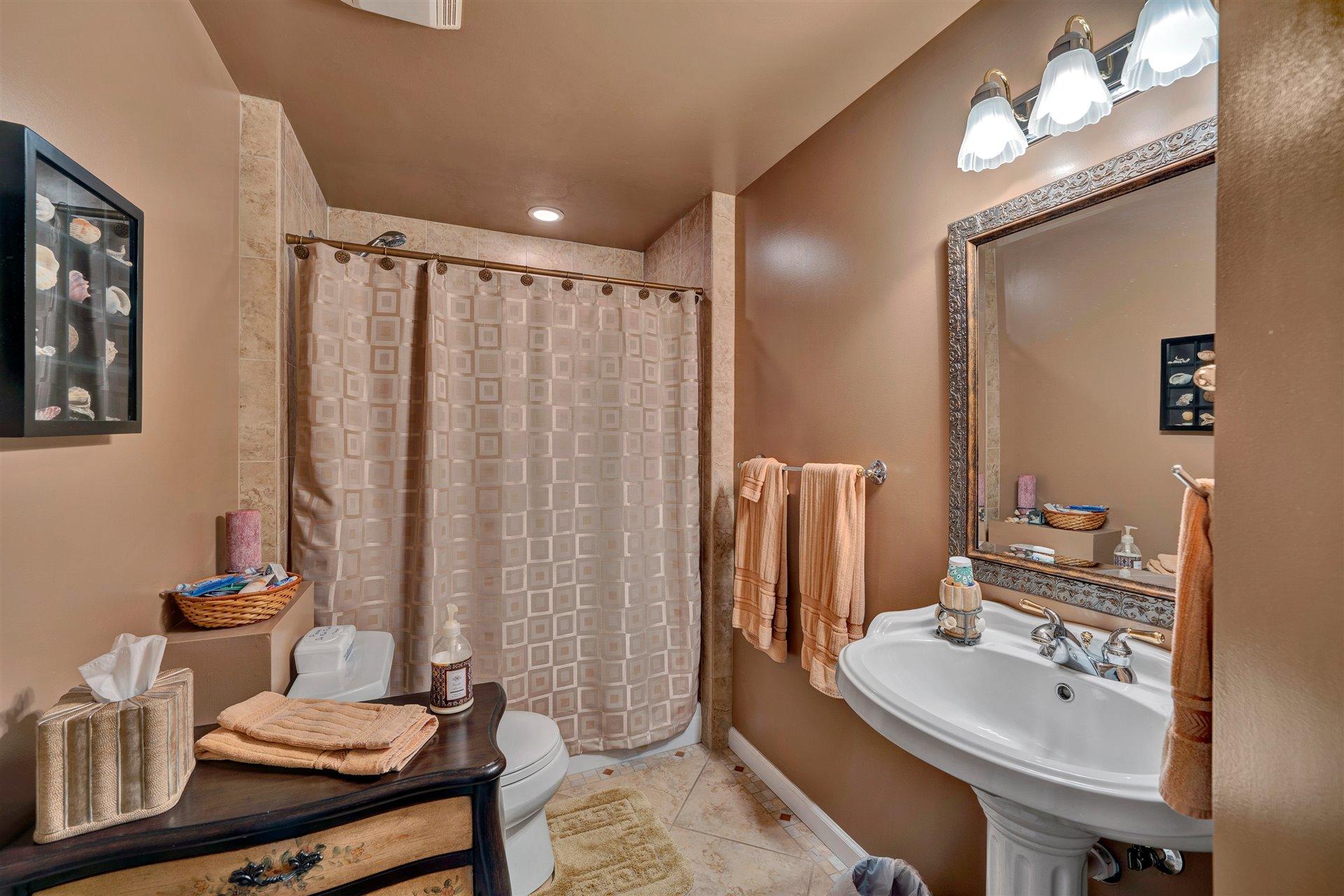 11 Cedar Bay Road Union Hall, VA 24176 - Photo 39 of 60 a bathroom with a sink vanity mirror and toilet