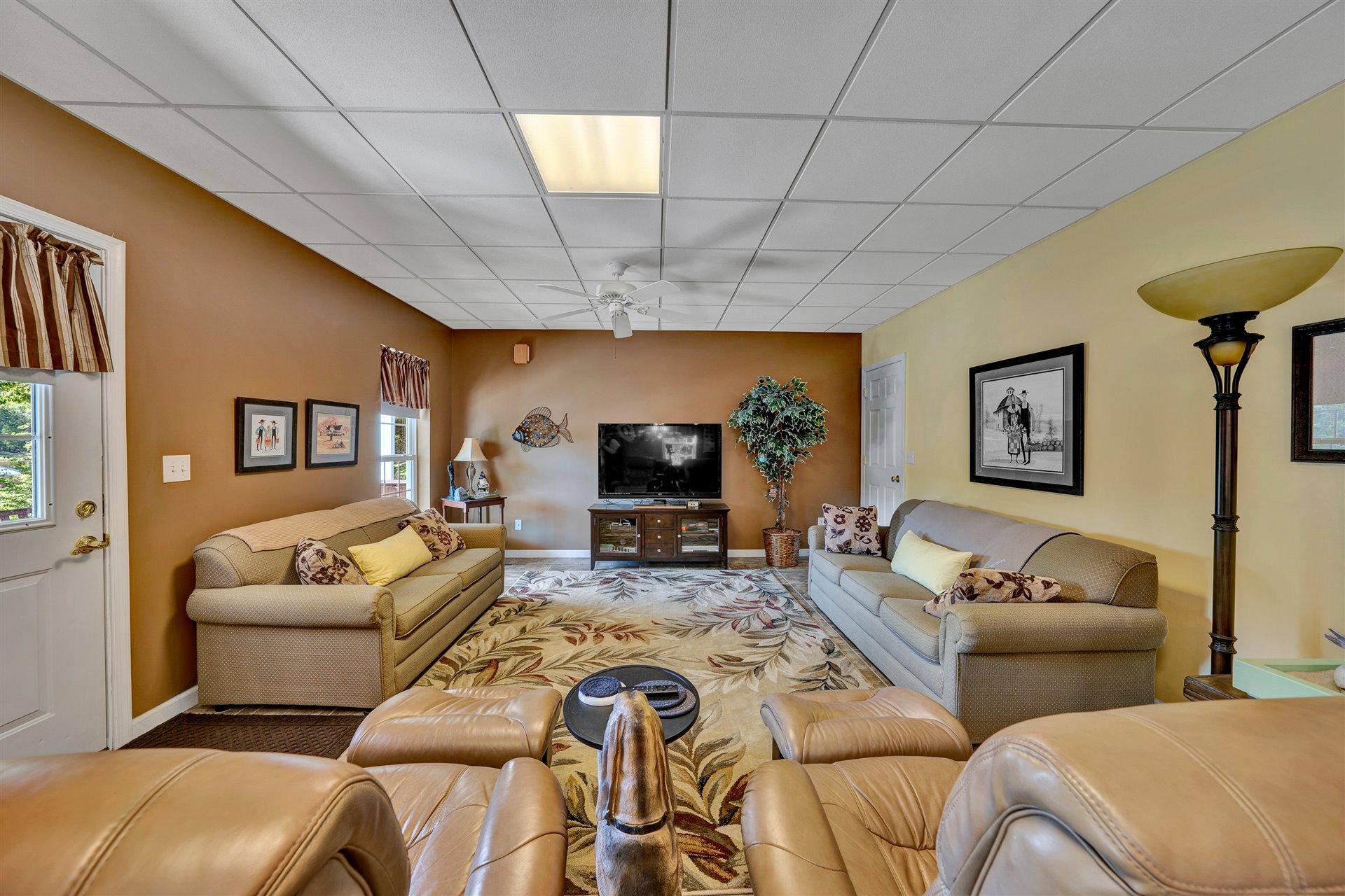 11 Cedar Bay Road Union Hall, VA 24176 - Photo 43 of 60 a living room with furniture and a flat screen tv