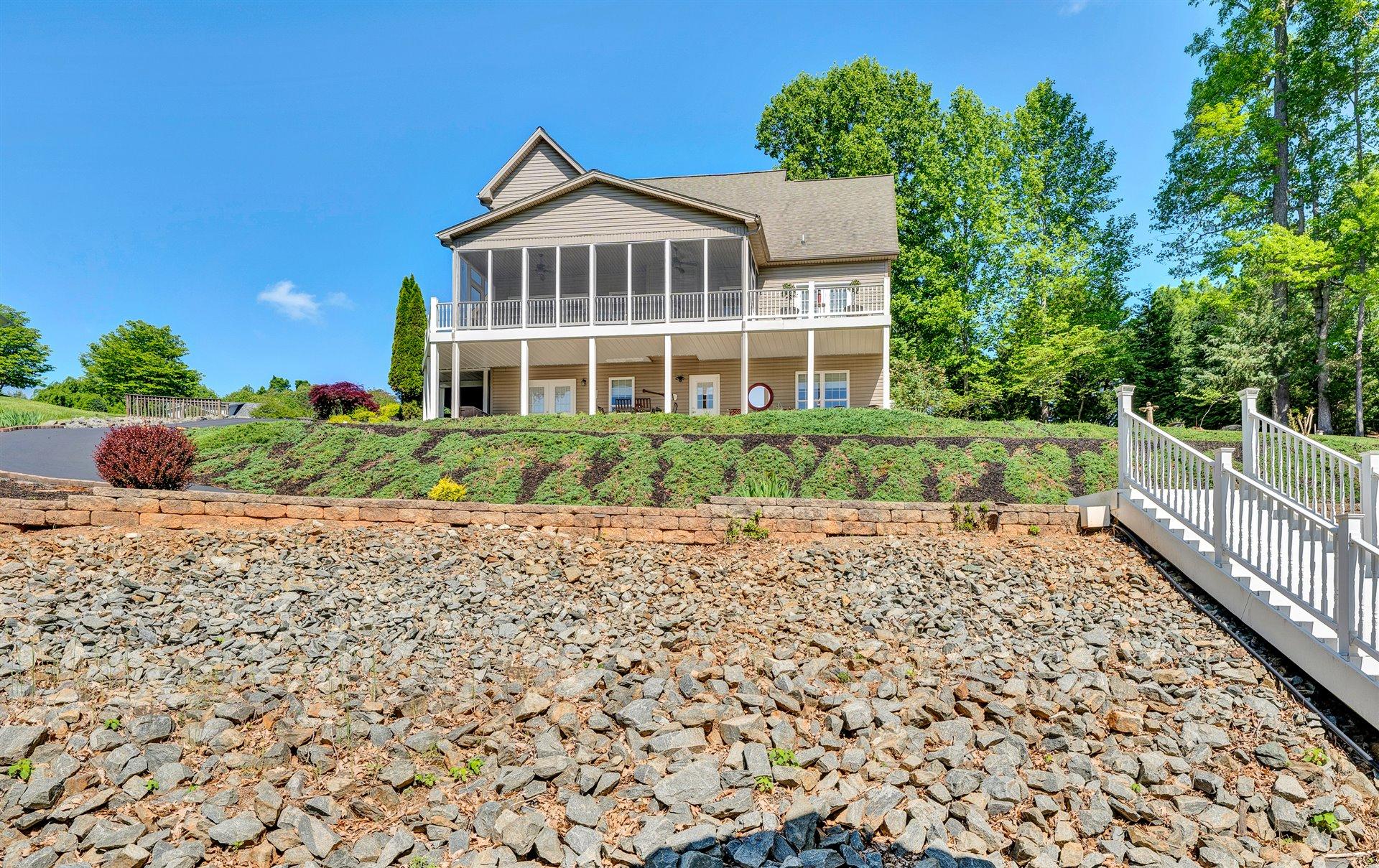 11 Cedar Bay Road Union Hall, VA 24176 - Photo 55 of 60 a front view of a house with a garden
