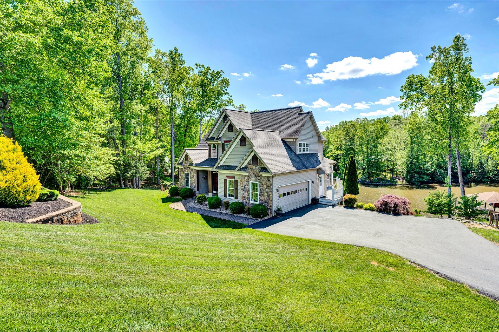 11 Cedar Bay Road Union Hall, VA 24176 - Photo 56 of 60 a view of house with outdoor space and swimming pool