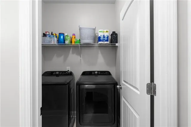 a kitchen with a stove and a refrigerator