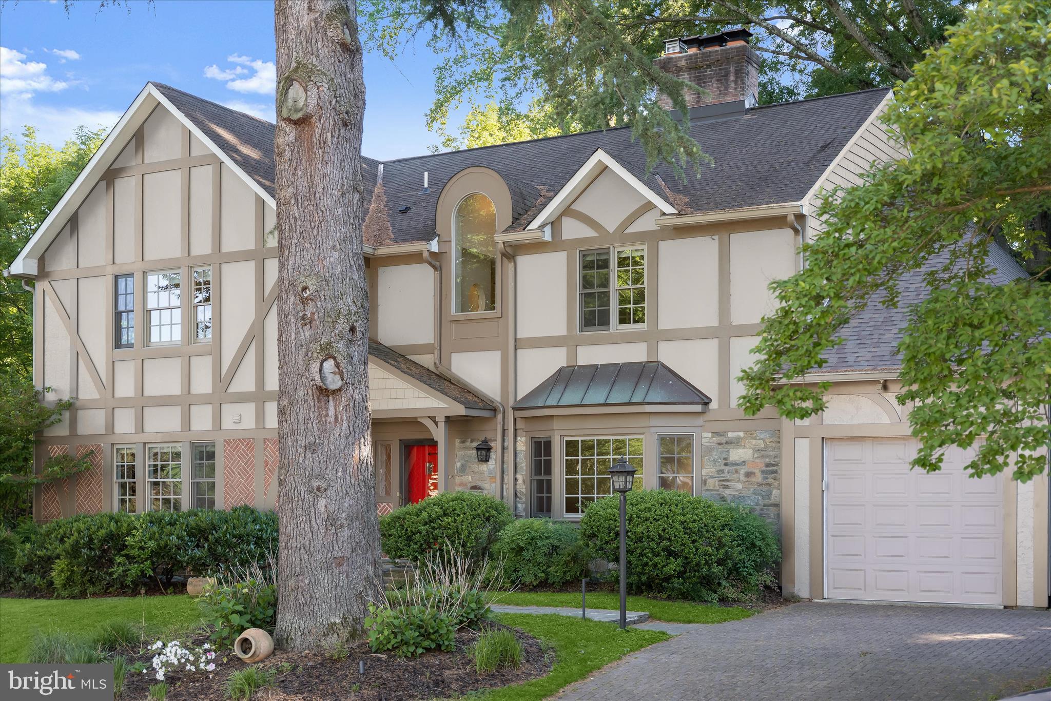 5104 Scarsdale Road Bethesda, MD 20816 - Photo 68 of 68 a front view of a house with a yard