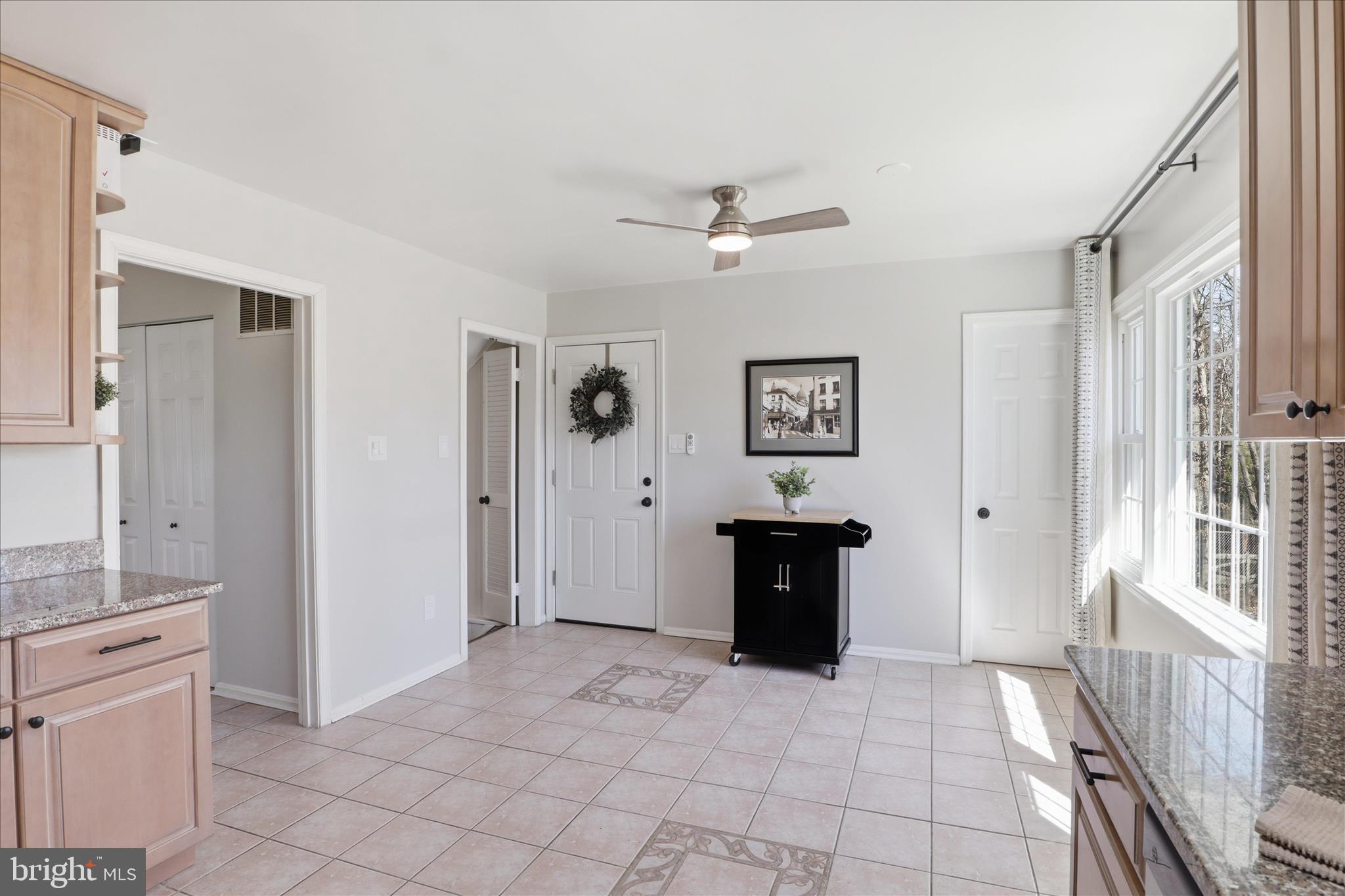 8109 Overton Court Springfield, VA 22153 - Photo 11 of 38 a view of kitchen with a sink and a refrigerator