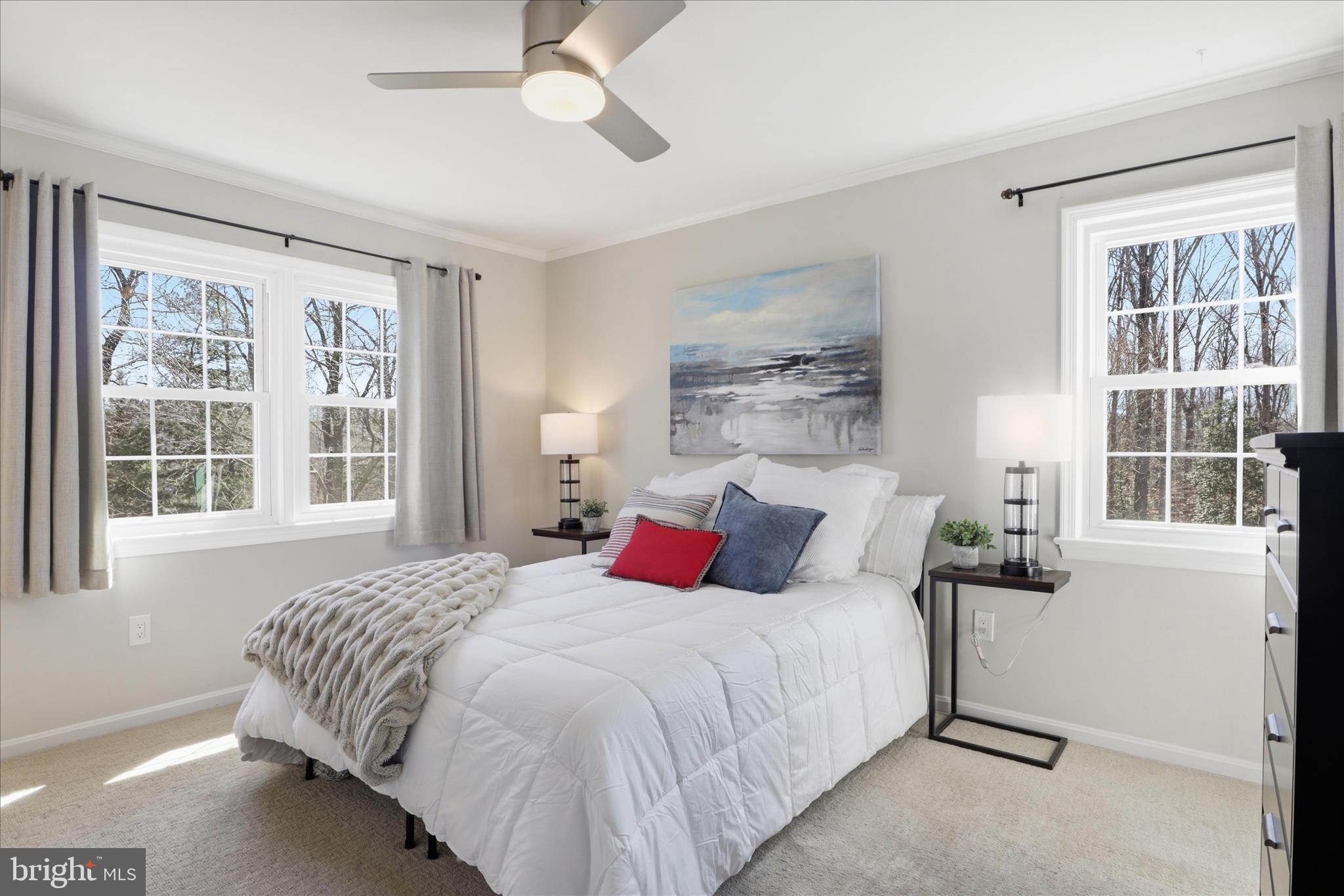 8109 Overton Court Springfield, VA 22153 - Photo 17 of 38 a bedroom with bed and a window