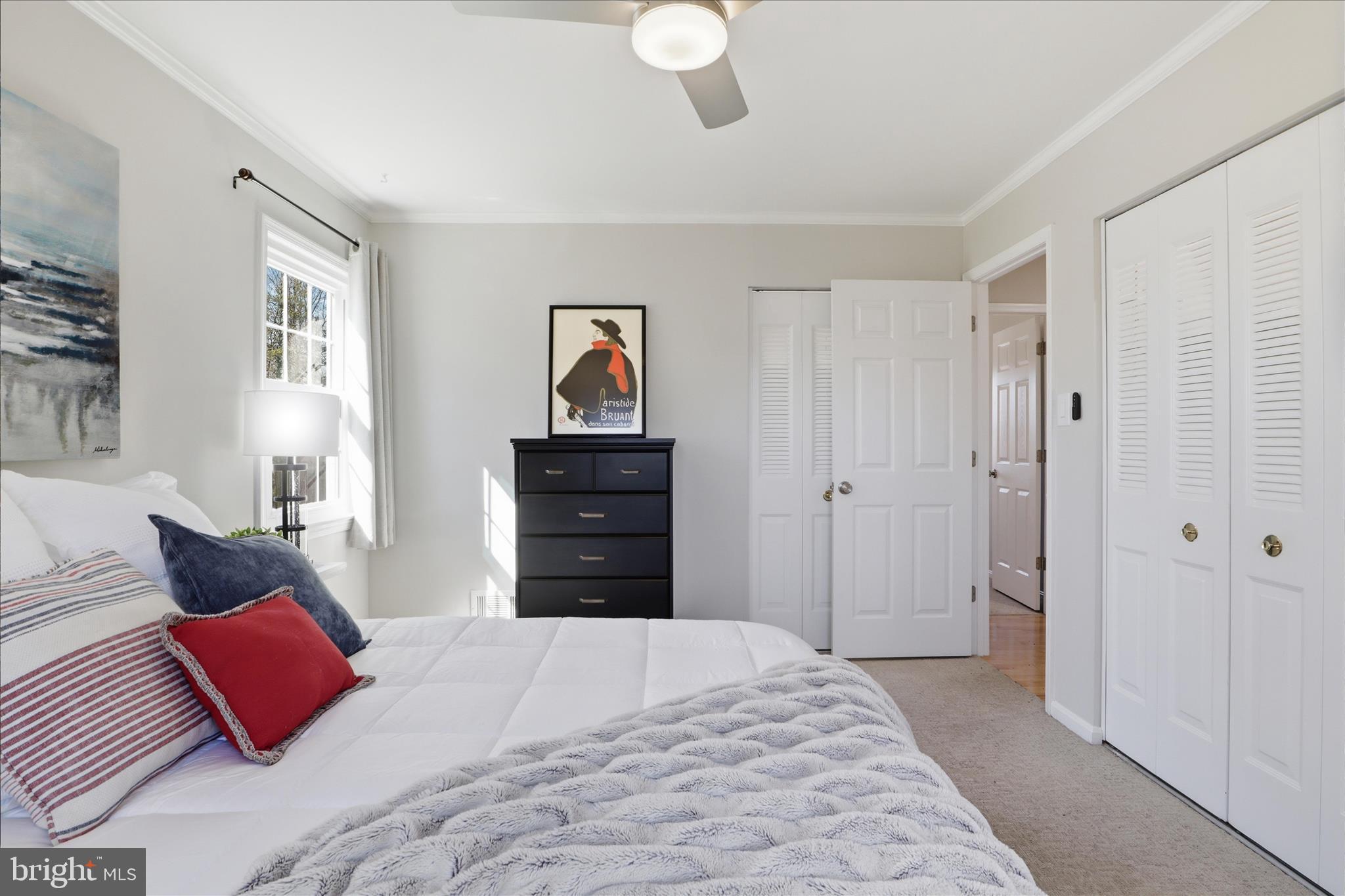 8109 Overton Court Springfield, VA 22153 - Photo 18 of 38 a bedroom with a bed and a couch