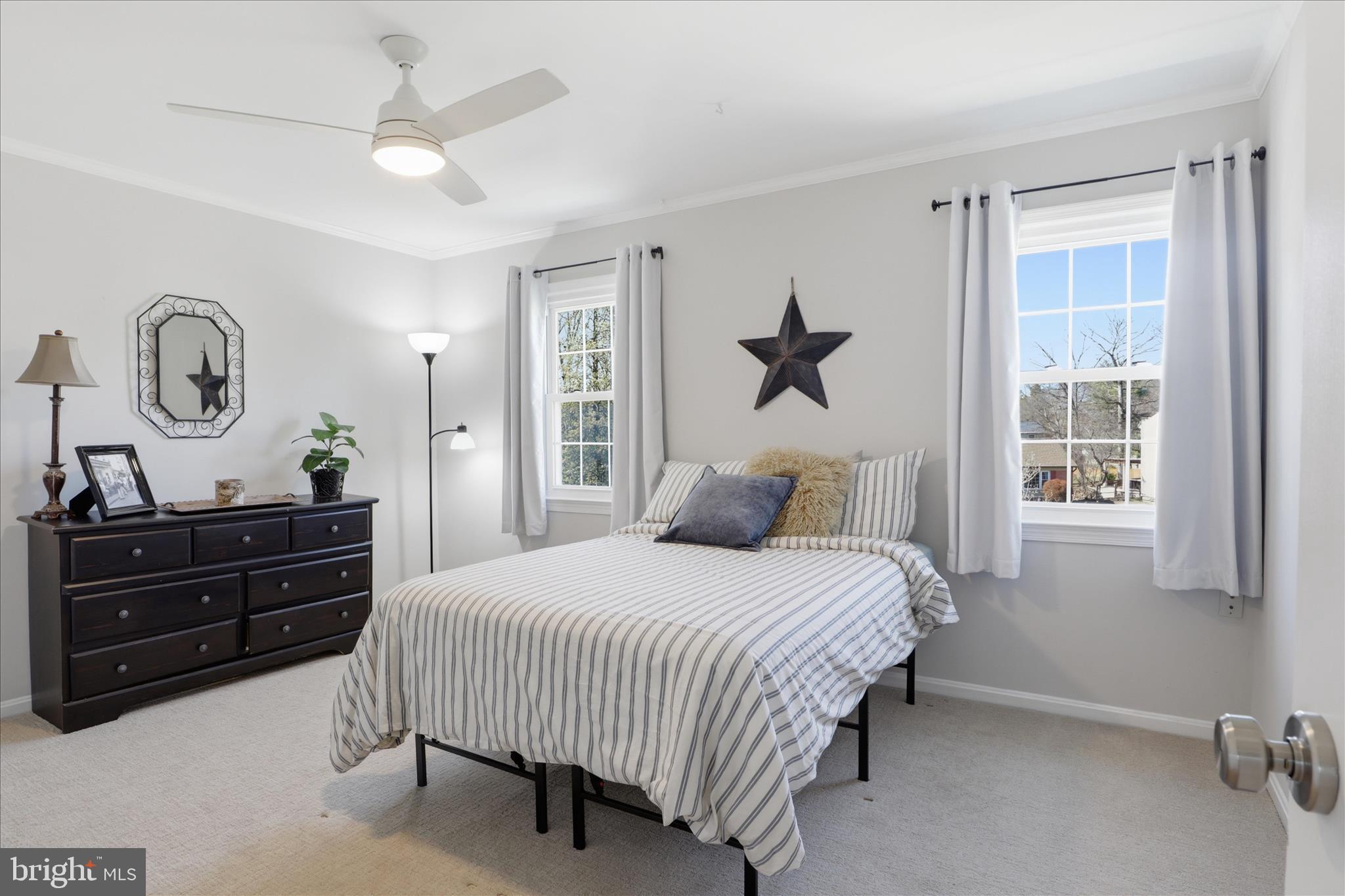 8109 Overton Court Springfield, VA 22153 - Photo 20 of 38 a bedroom with a bed and a closet