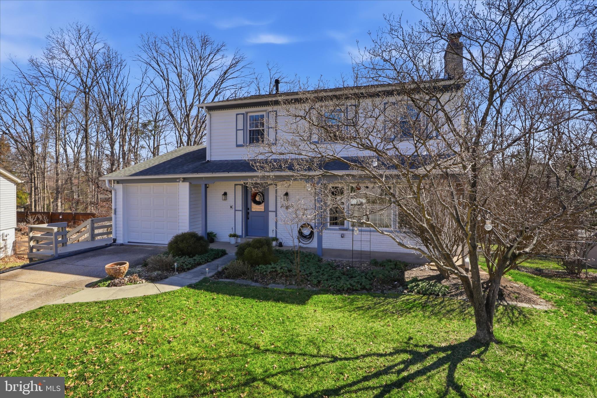8109 Overton Court Springfield, VA 22153 - Photo 2 of 38 a view of a house with backyard and garden