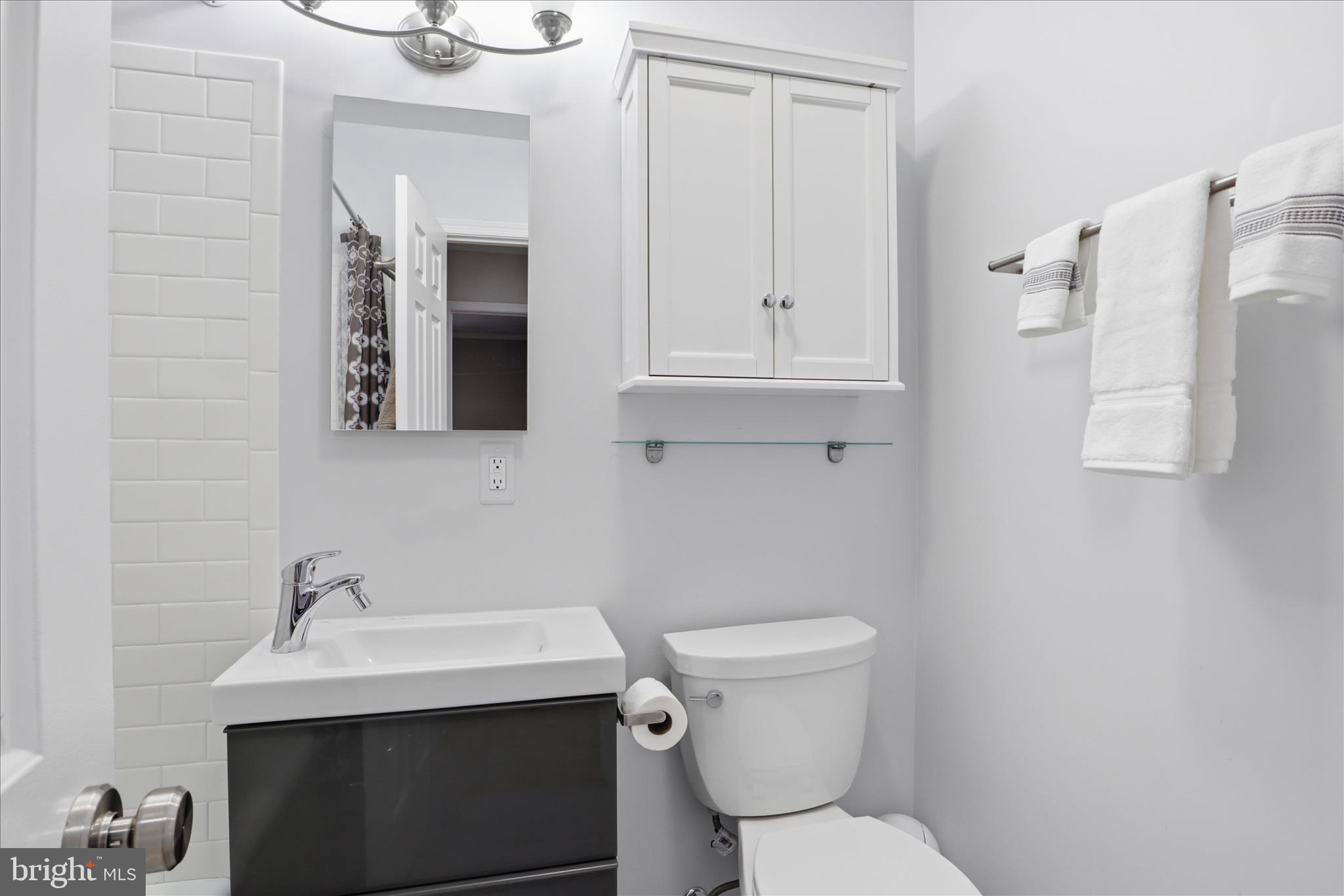 8109 Overton Court Springfield, VA 22153 - Photo 23 of 38 a bathroom with a sink toilet and vanity