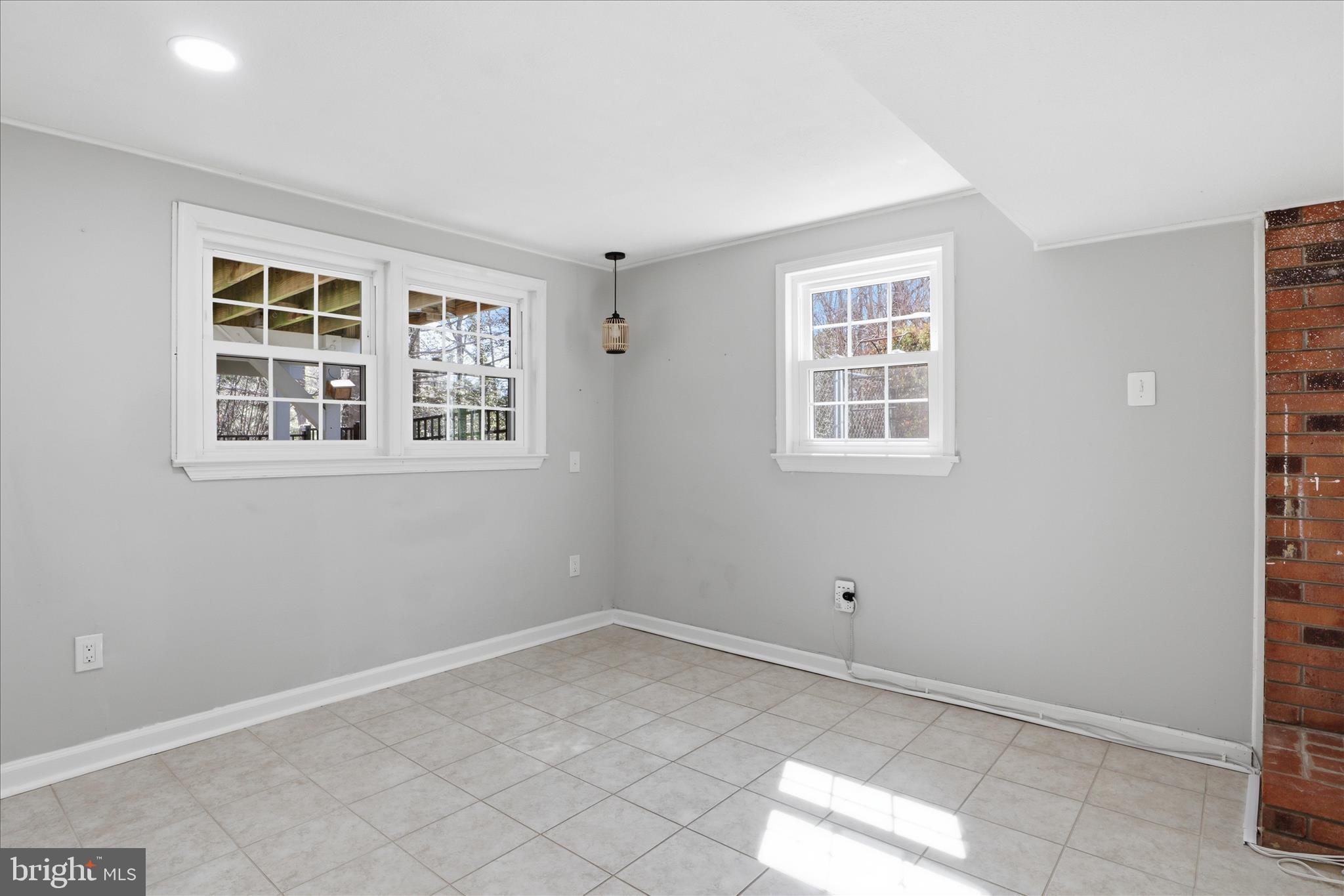 8109 Overton Court Springfield, VA 22153 - Photo 27 of 38 a view of empty room with windows