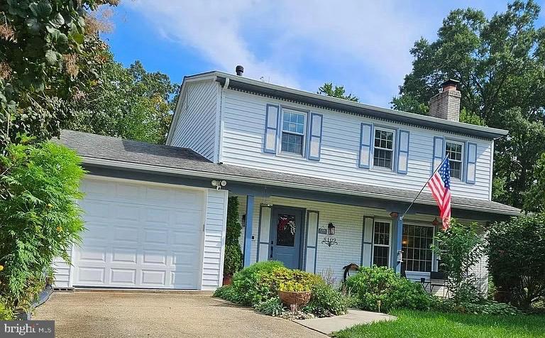 8109 Overton Court Springfield, VA 22153 - Photo 3 of 38 front view of a house with a yard