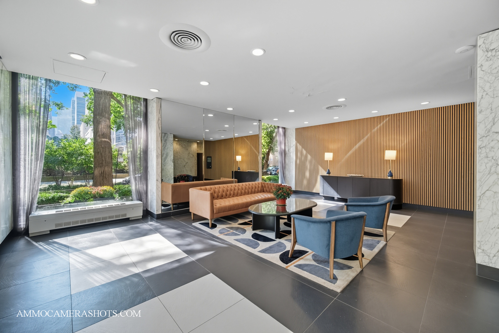 222 East Pearson Street, Unit 1406 Chicago, IL 60611 - Photo 24 of 30 a room with furniture and a large window