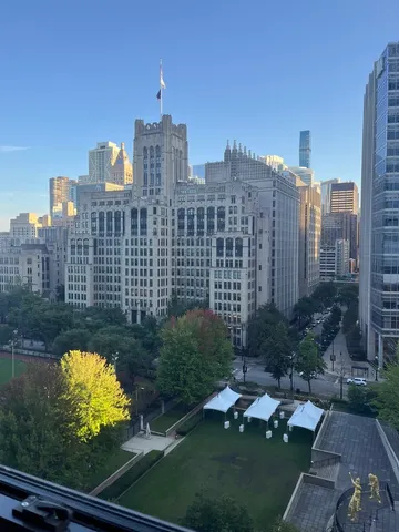 a view of a city with tall buildings