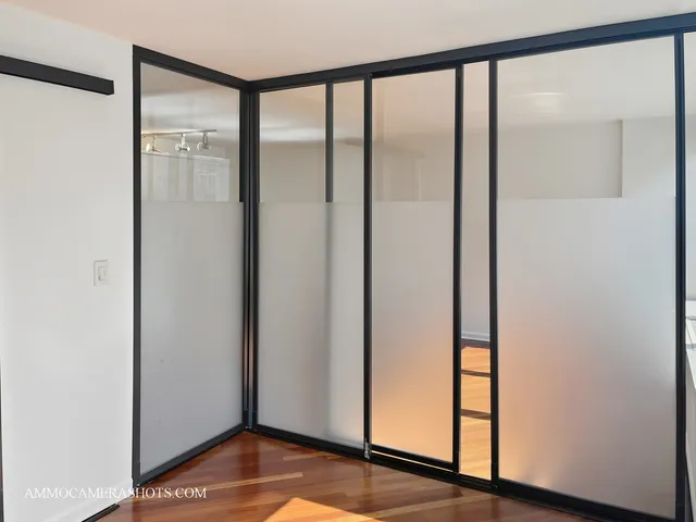 a view of front door with wooden floor