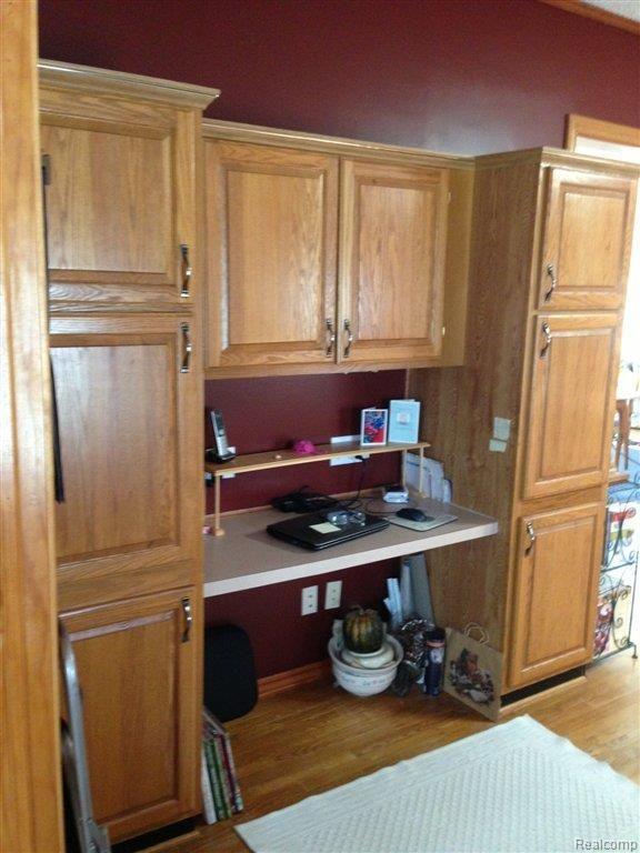 18576 Tipsico Lake Road Fenton, MI 48430 - Photo 11 of 15 BUILT-IN DESK