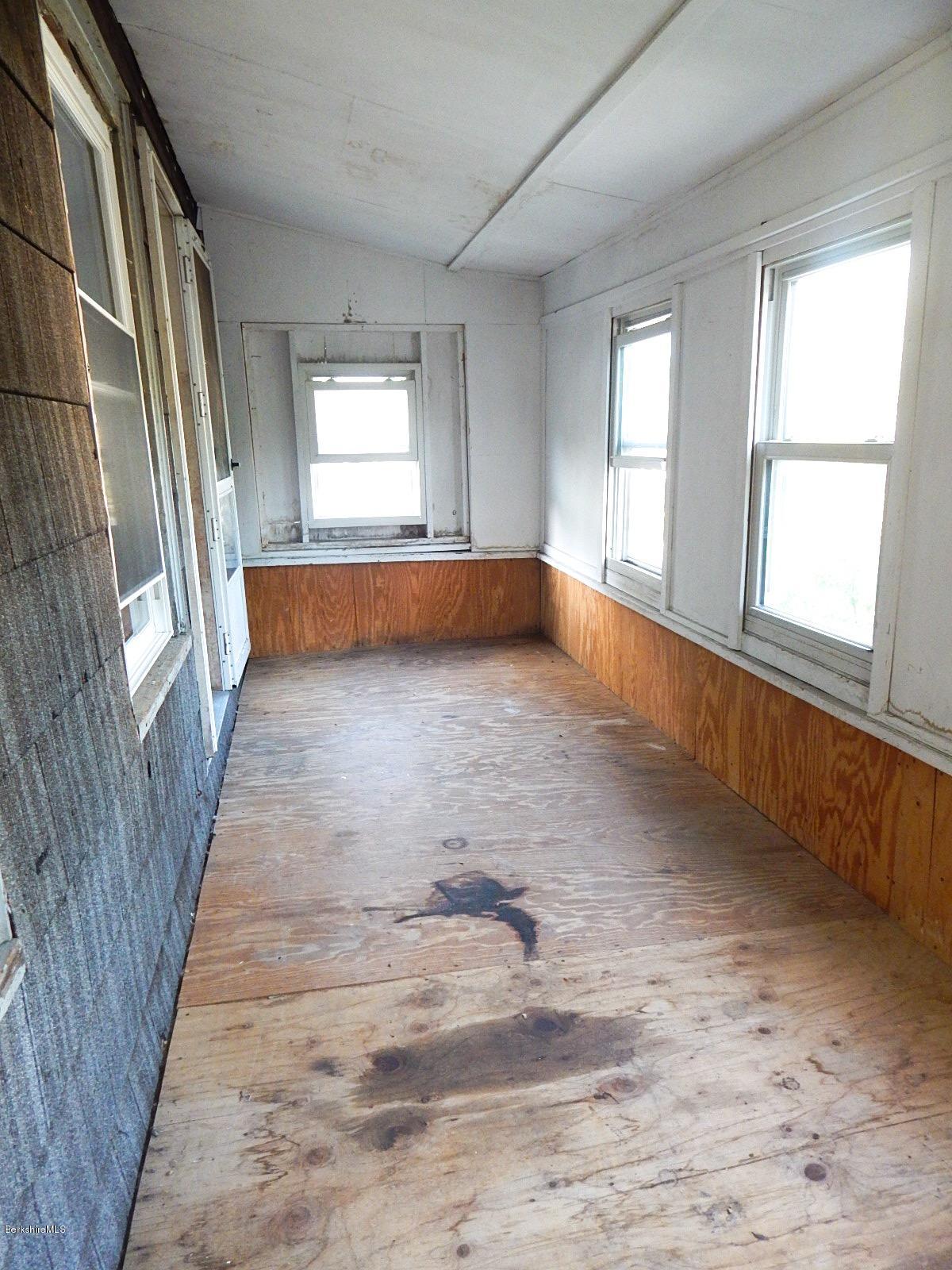 15-17 Spring Street Pittsfield, MA 01201 - Photo 34 of 44 Enclosed porch