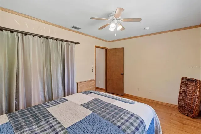 a view of a green field with lots of bushes