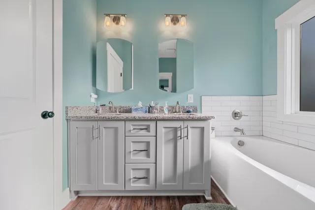 a bathroom with a shower curtain and a toilet next to it