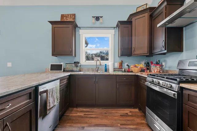 a view of livingroom with furniture and wooden floor