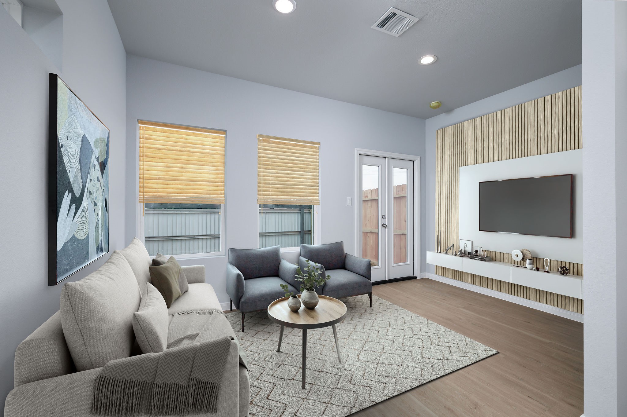 18834 Elegance Ave Spring Spring, TX 77379 - Photo 7 of 19 a living room with furniture a flat screen tv and a large window