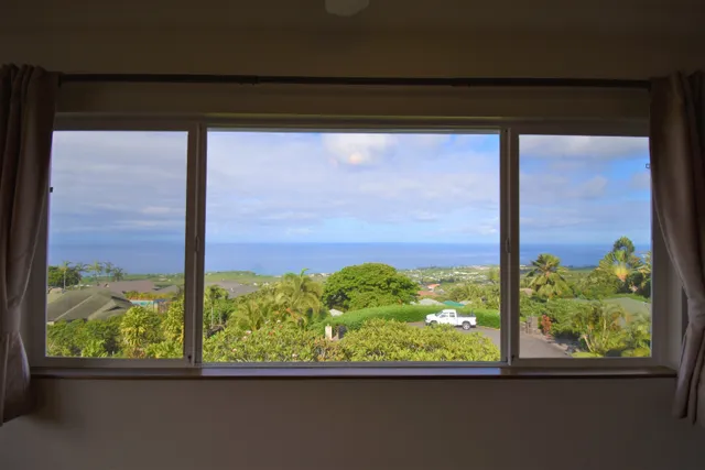 a view of a hallway with washer and dryer