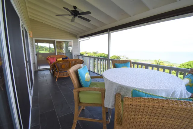 a view of a room wooden floor and staircase