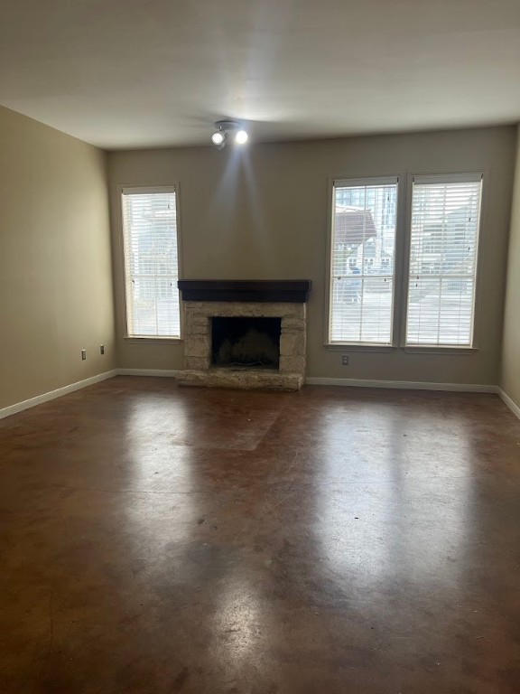 2529 Rio Grande Street, Unit 31 Austin, TX 78705 - Photo 1 of 21 an empty room with wooden floor and windows