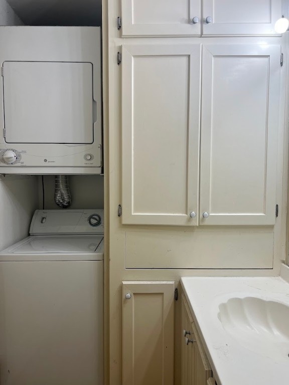 2529 Rio Grande Street, Unit 31 Austin, TX 78705 - Photo 16 of 21 a utility room with a sink washer and dryer