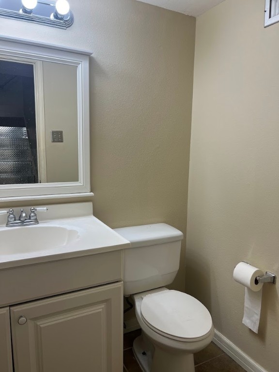 2529 Rio Grande Street, Unit 31 Austin, TX 78705 - Photo 9 of 21 a bathroom with a sink a toilet a mirror and shower