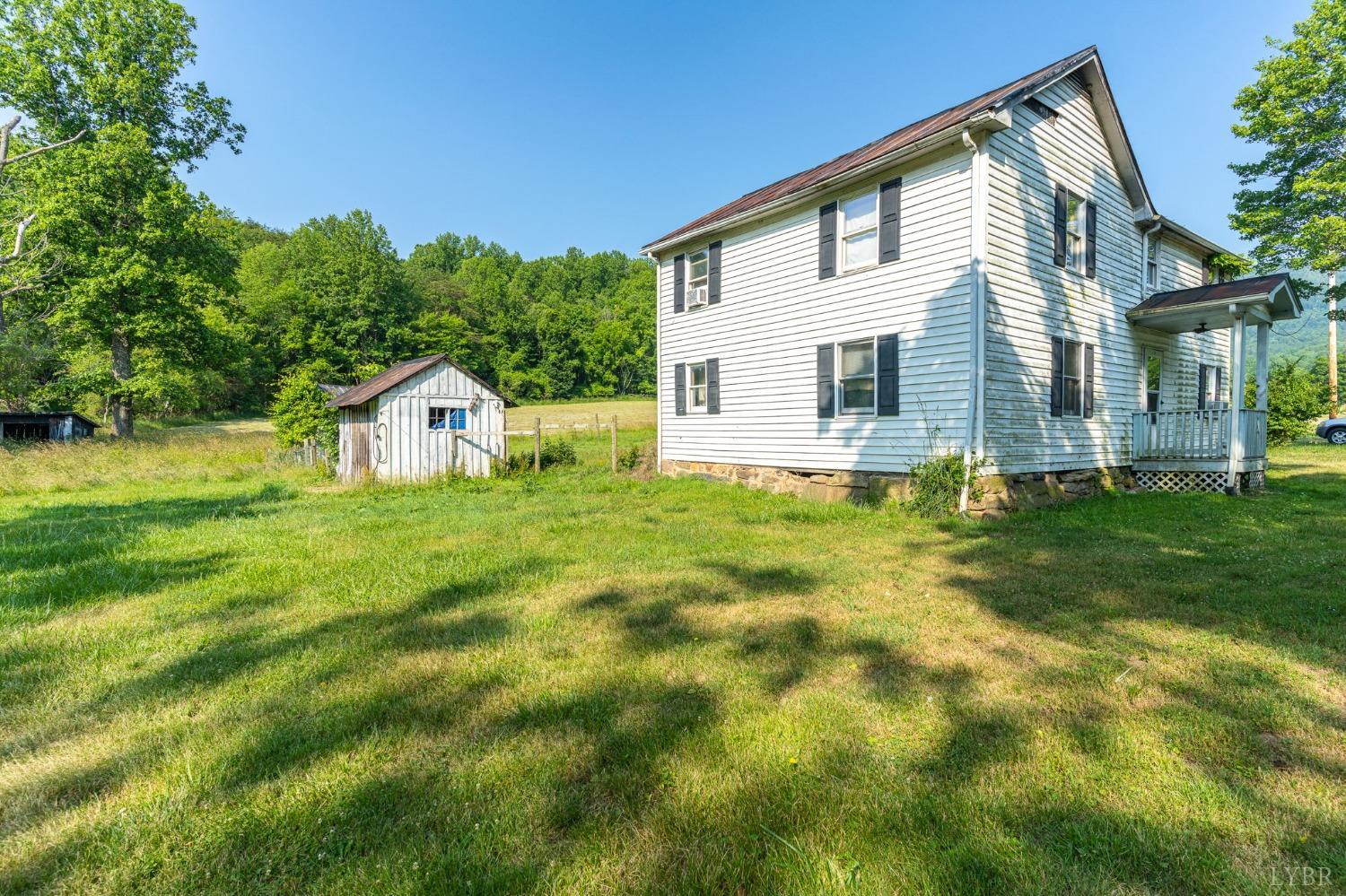 1095 Blacks Creek Road Lexington, VA 24450 - Photo 12 of 35 a front view of house with garden