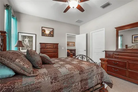 a spacious bathroom with a shower sink and mirror