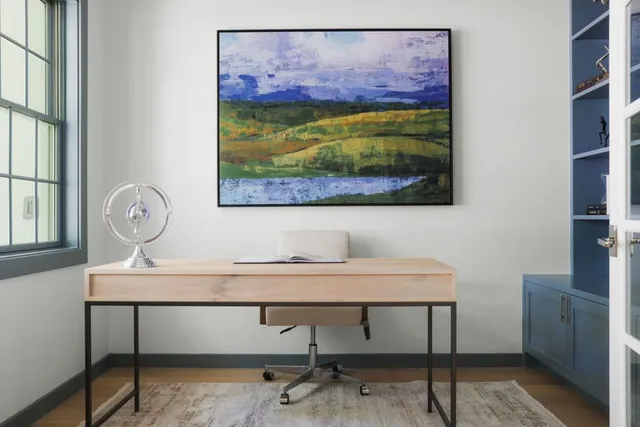 a view of a workspace with furniture