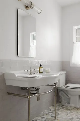 a bathroom with a sink and a toilet