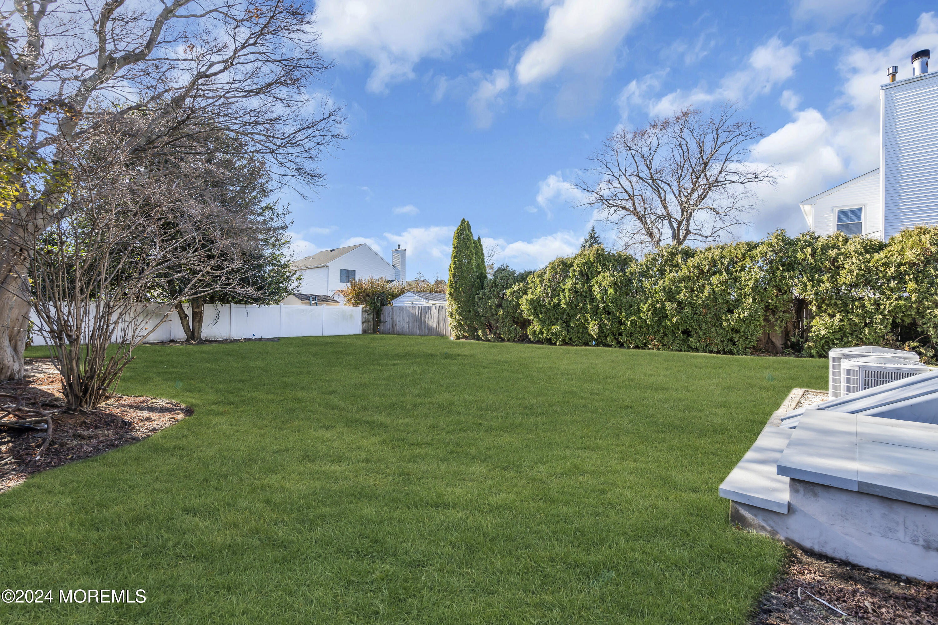 709 Prospect Avenue Spring Lake Heights, NJ 07762 - Photo 30 of 32 a view of a garden with trees