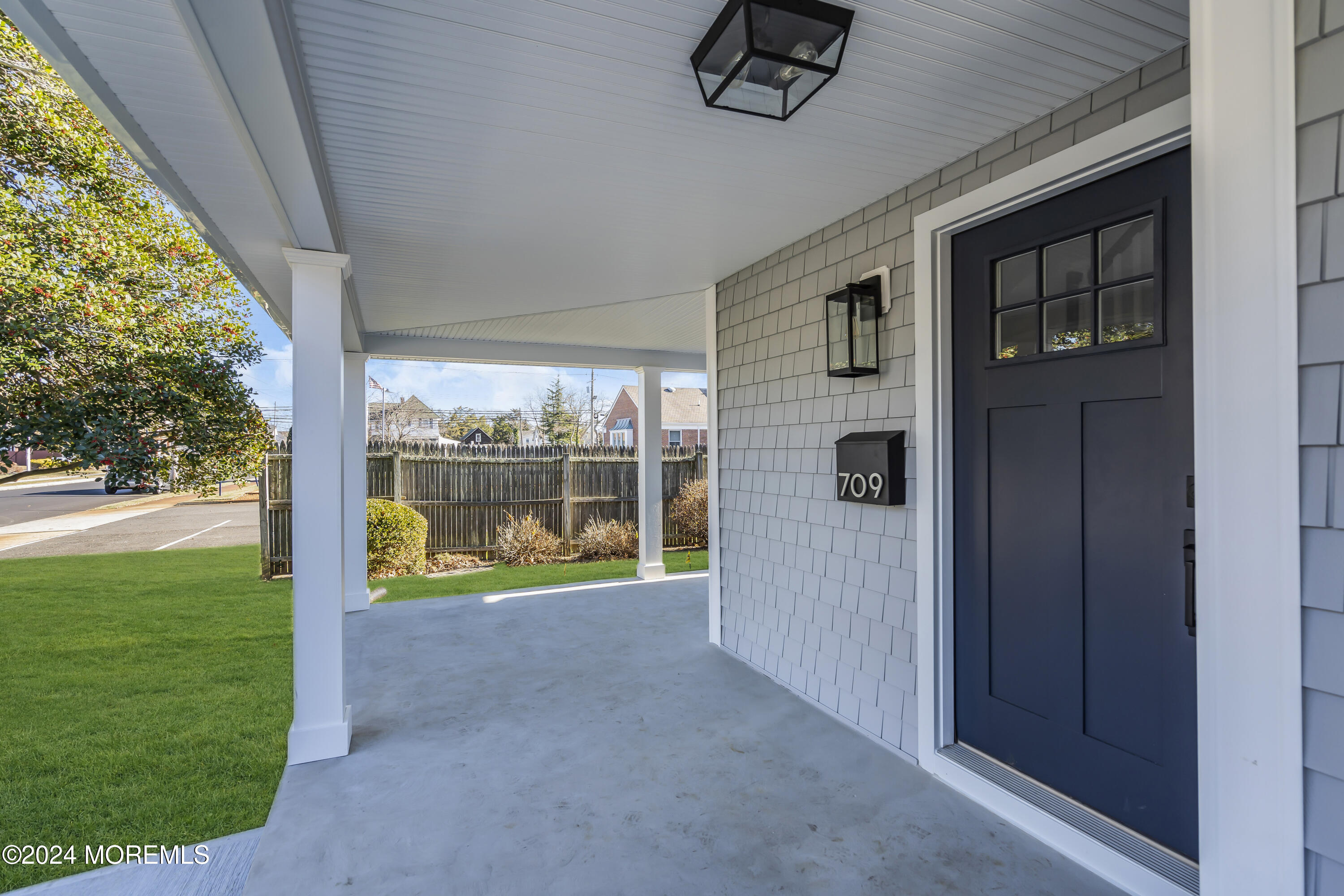709 Prospect Avenue Spring Lake Heights, NJ 07762 - Photo 3 of 32 a view of an empty room with a floor to ceiling window and garden