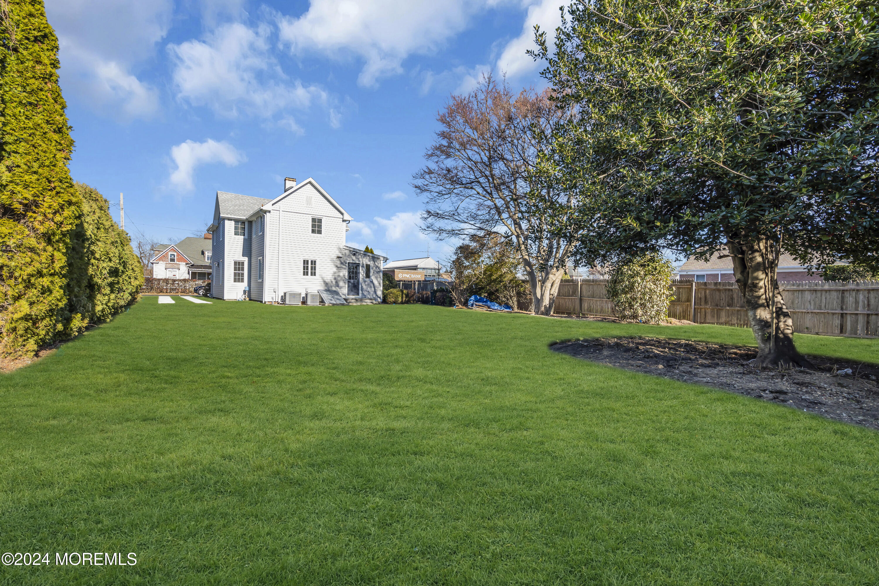 709 Prospect Avenue Spring Lake Heights, NJ 07762 - Photo 32 of 32 a view of a house with a yard