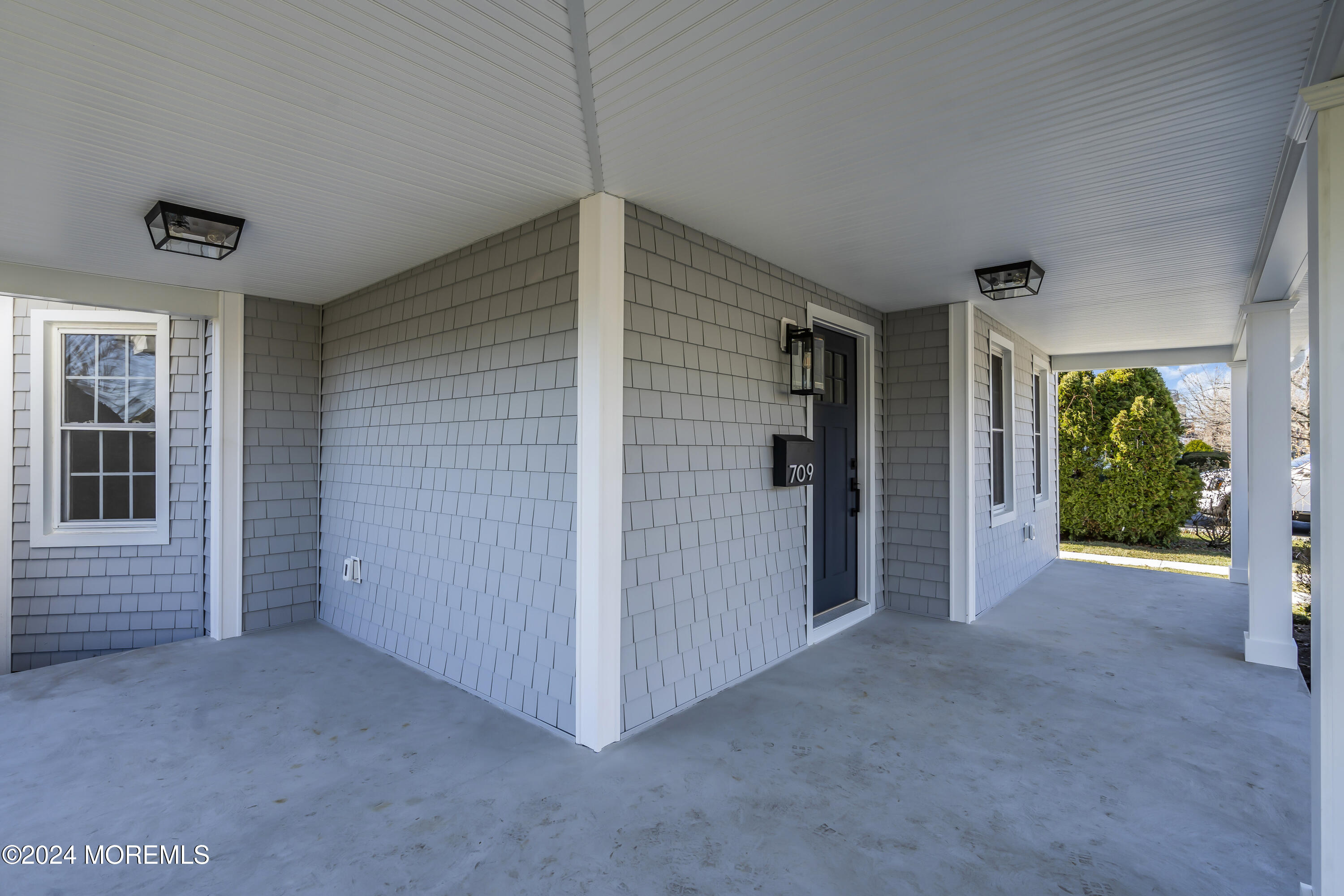 709 Prospect Avenue Spring Lake Heights, NJ 07762 - Photo 4 of 32 a view of a livingroom with an empty space and a window