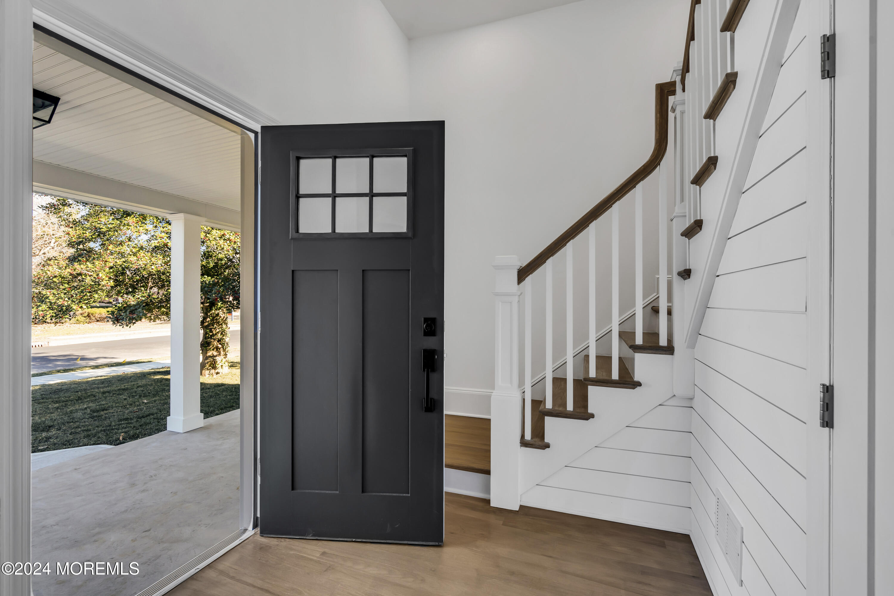 709 Prospect Avenue Spring Lake Heights, NJ 07762 - Photo 5 of 32 a view of entryway with wooden floor and front door