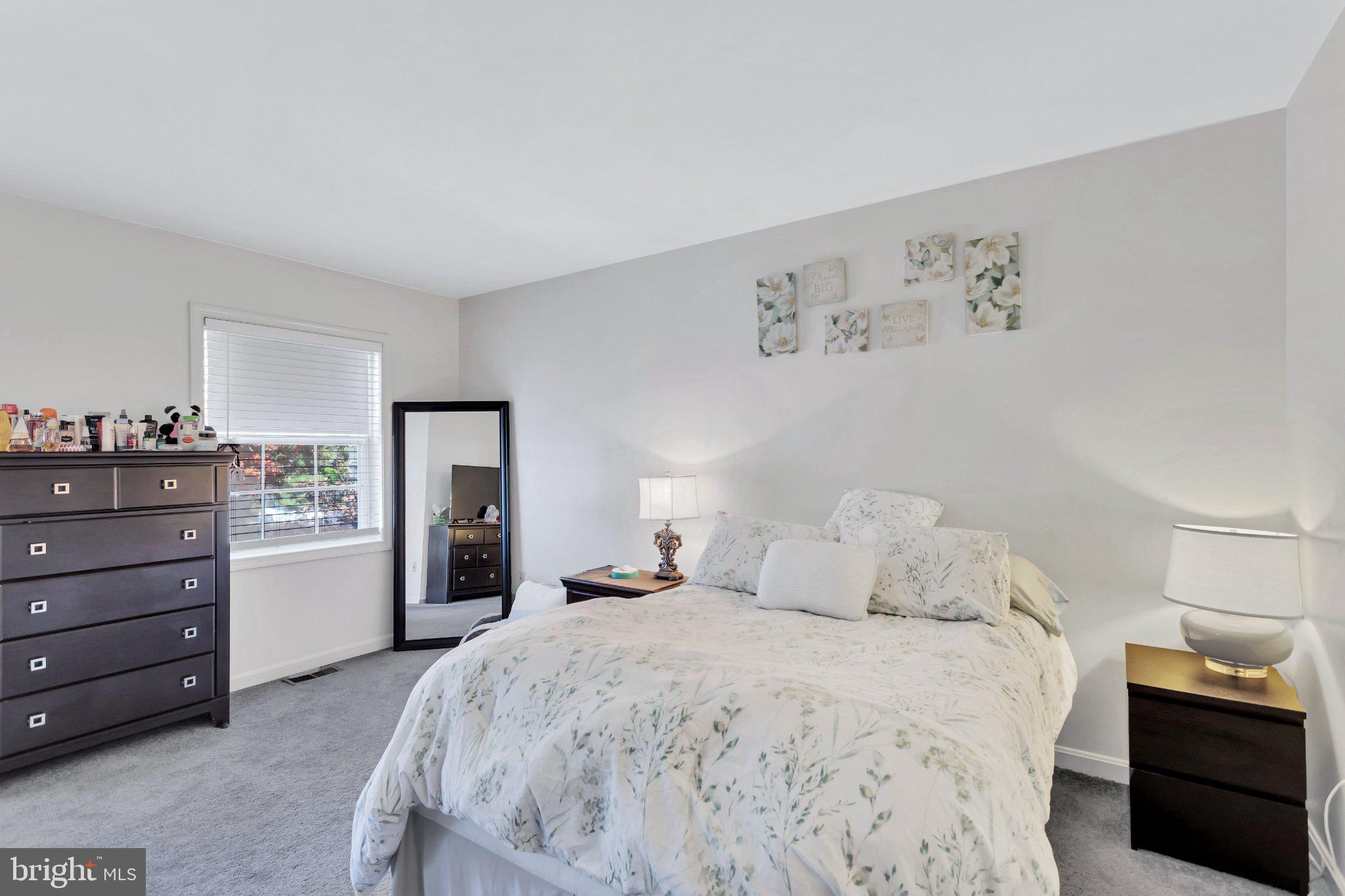 9009 Sweet Birch Court Springfield, VA 22152 - Photo 21 of 34 Serene bedroom with soft decor.