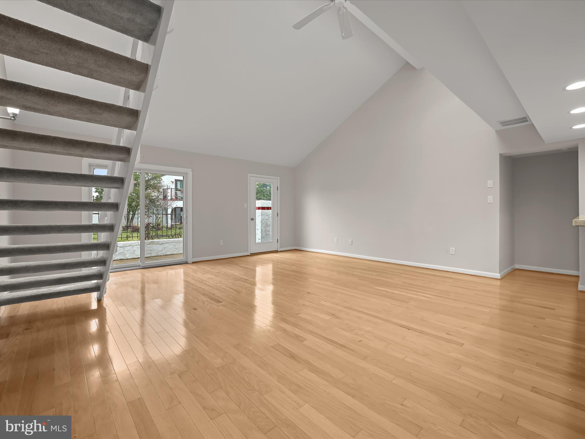 2 Queen Victoria Way Chester, MD 21619 - Photo 12 of 53 a view of empty room with wooden floor and fan