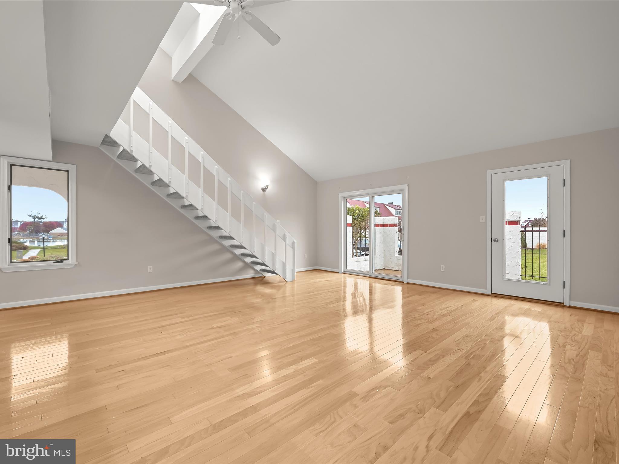 2 Queen Victoria Way Chester, MD 21619 - Photo 13 of 53 a view of empty room with wooden floor and fan
