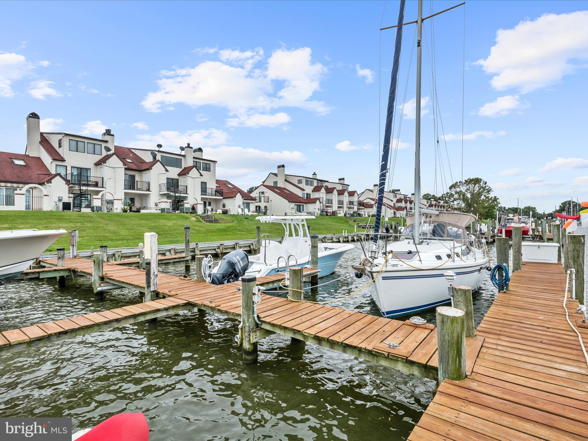 2 Queen Victoria Way Chester, MD 21619 - Photo 4 of 53 a view of a lake with couches and city view