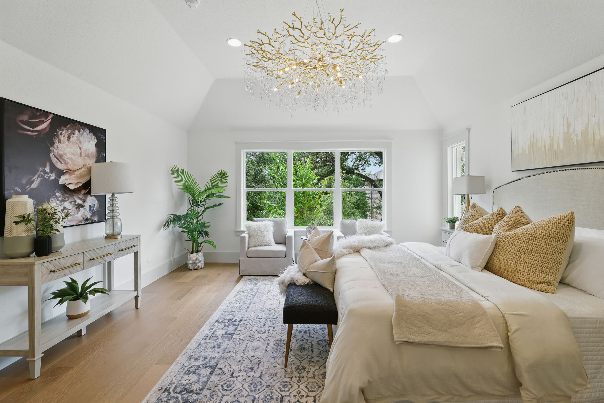 6905 Rudi Cove Austin, TX 78759 - Photo 22 of 36 Bedroom with lofted ceiling, multiple windows, light wood-style floors, a chandelier, and recessed lighting