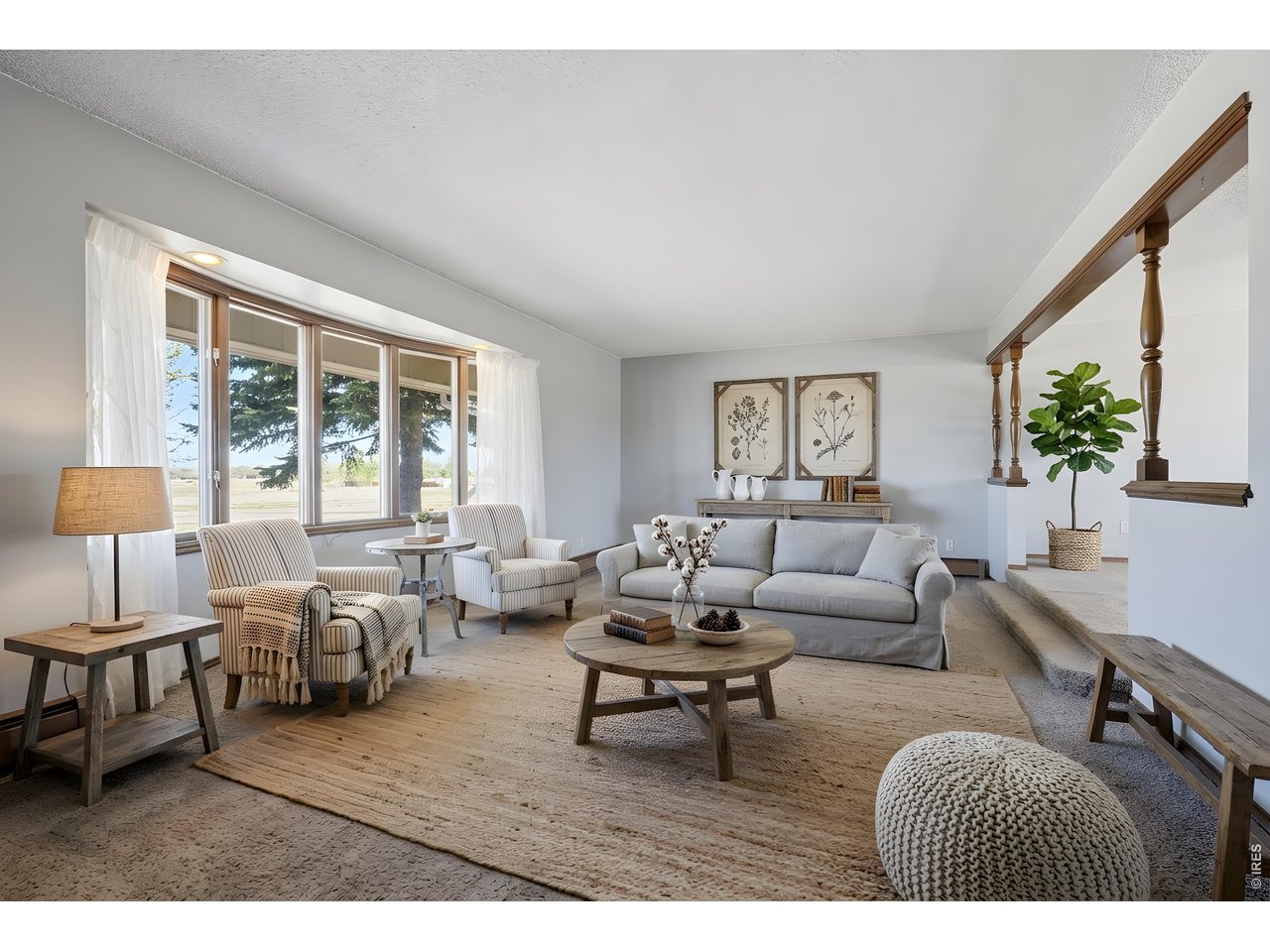 11098 Jasper Road Lafayette, CO 80026 - Photo 26 of 50 a living room with furniture and a large window