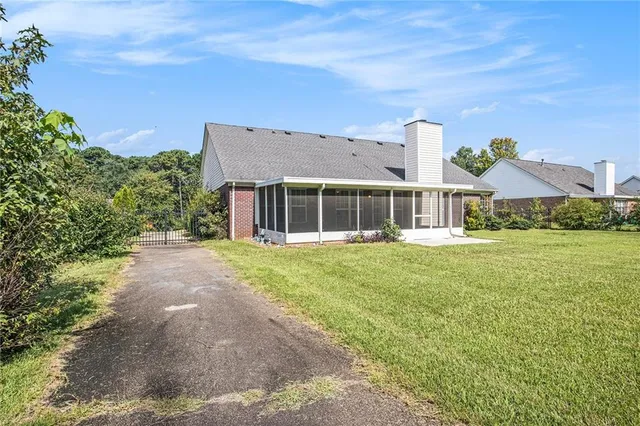 a house view with a garden space
