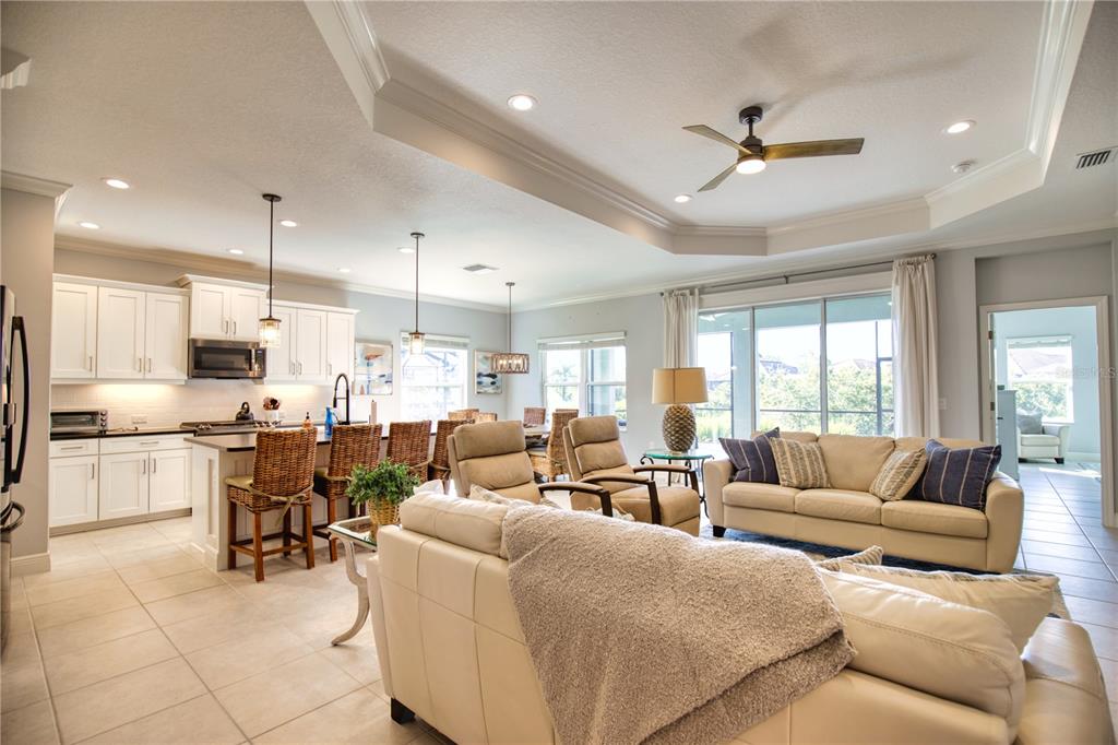 Undisclosed Address Venice, FL 34293 - Photo 13 of 45 a living room with furniture kitchen area and a window
