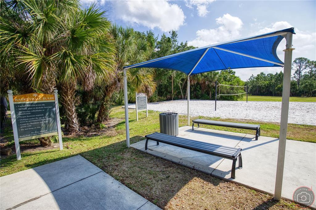 Undisclosed Address Venice, FL 34293 - Photo 39 of 45 a view of a backyard with swimming pool and sitting area