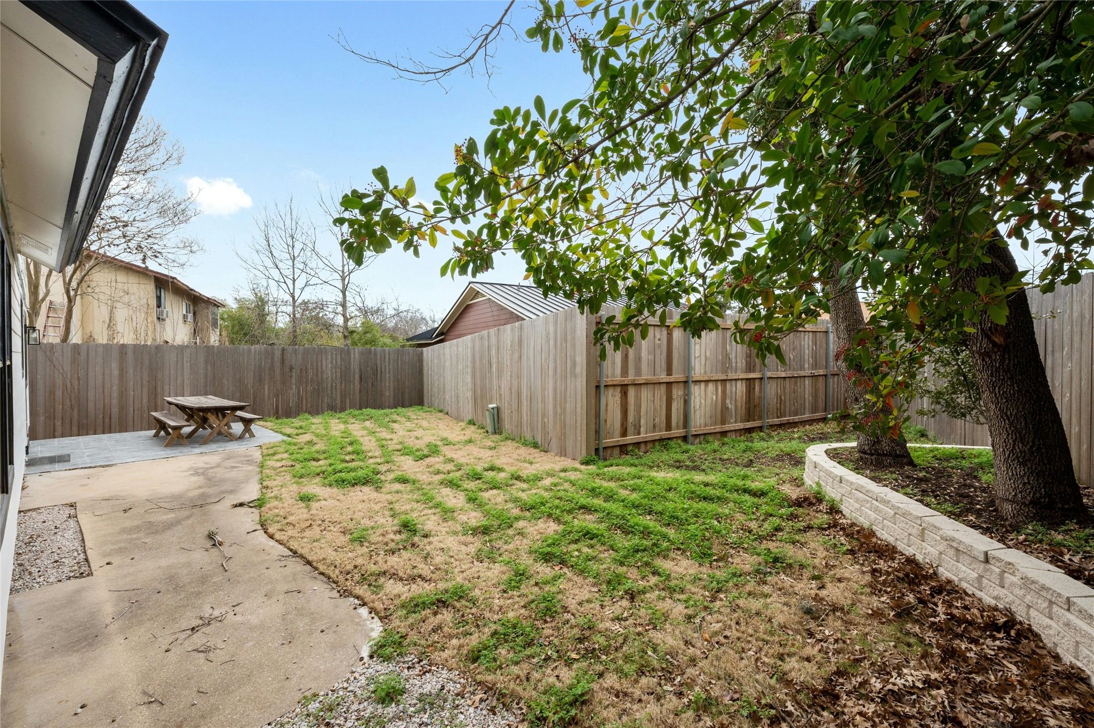 8303 Los Ranchos Drive Austin, TX 78749 - Photo 25 of 26 Fenced backyard with a patio area