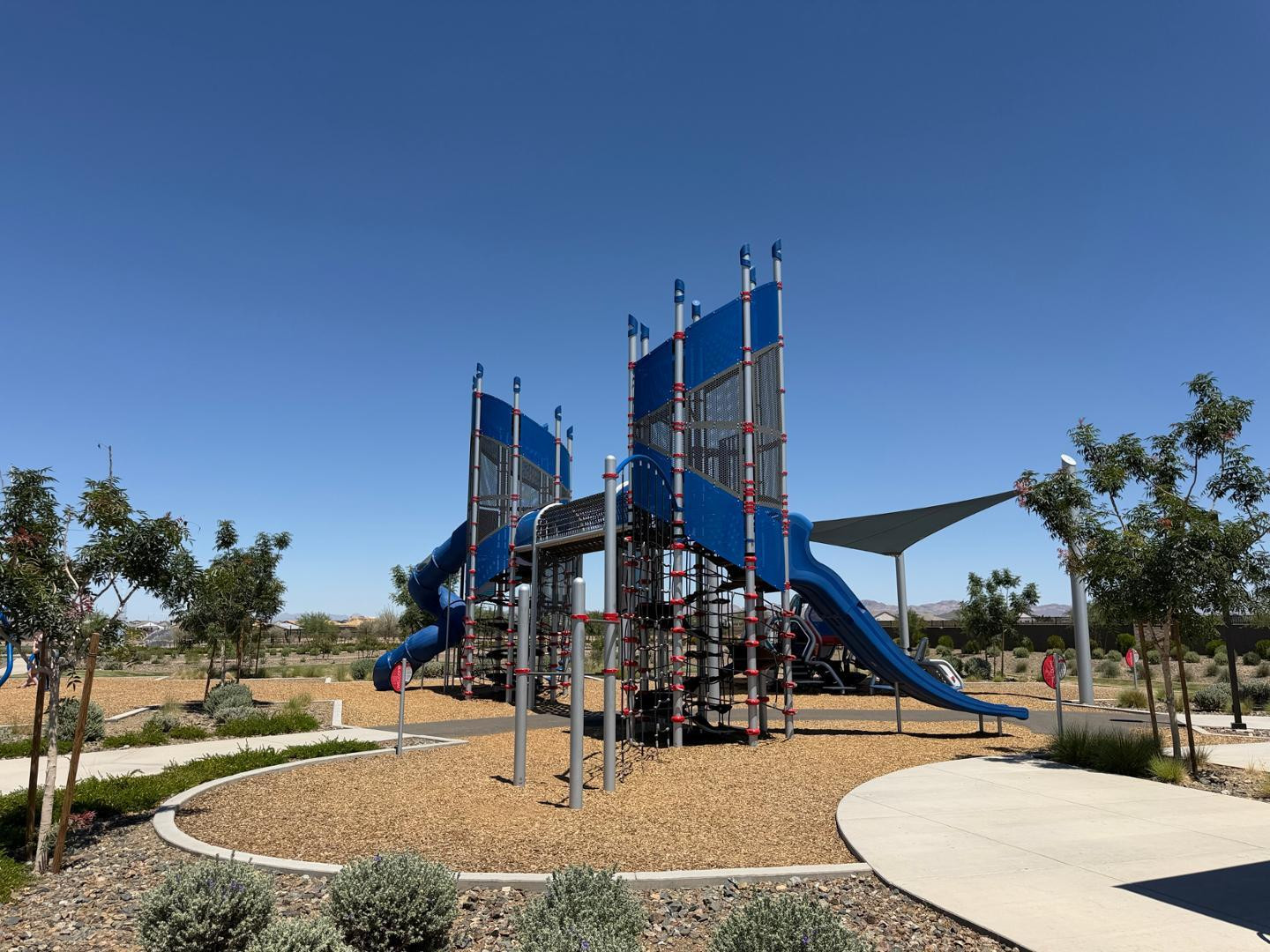 1840 West Spaulding Avenue Apache Junction, AZ 85120 - Photo 4 of 53 a view of a park with swings and slides