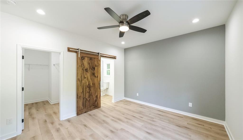 128 Pollard Road Temple, GA 30179 - Photo 17 of 36 wooden floor in an empty room with a window