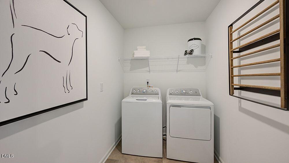 216 Hank Way Willow Spring, NC 27592 - Photo 16 of 42 a utility room with dryer and washer